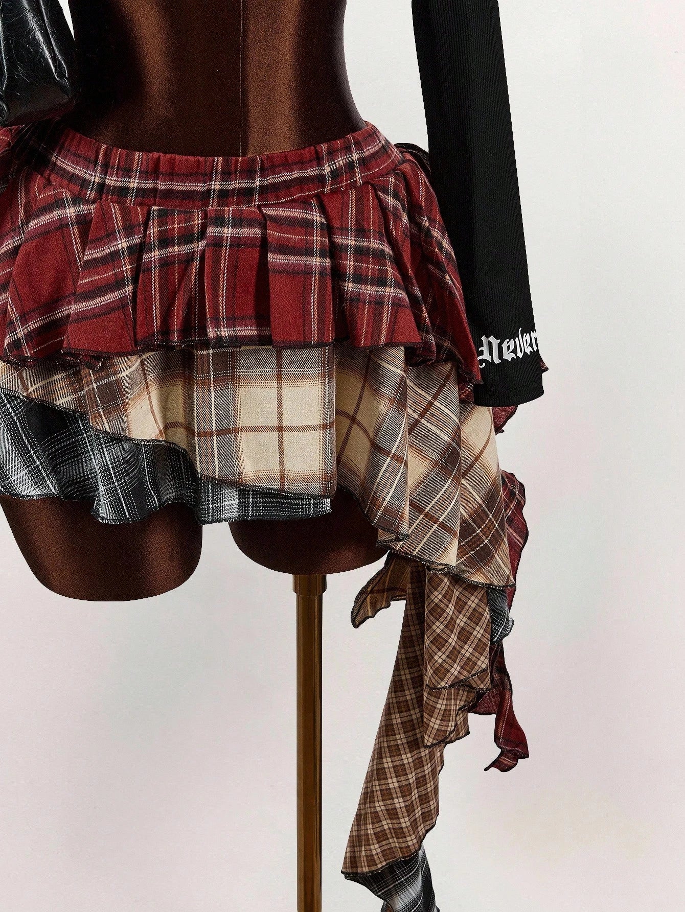 Amplova Asymmetric Ruffled Hem Mixed Plaid Mini Skirt