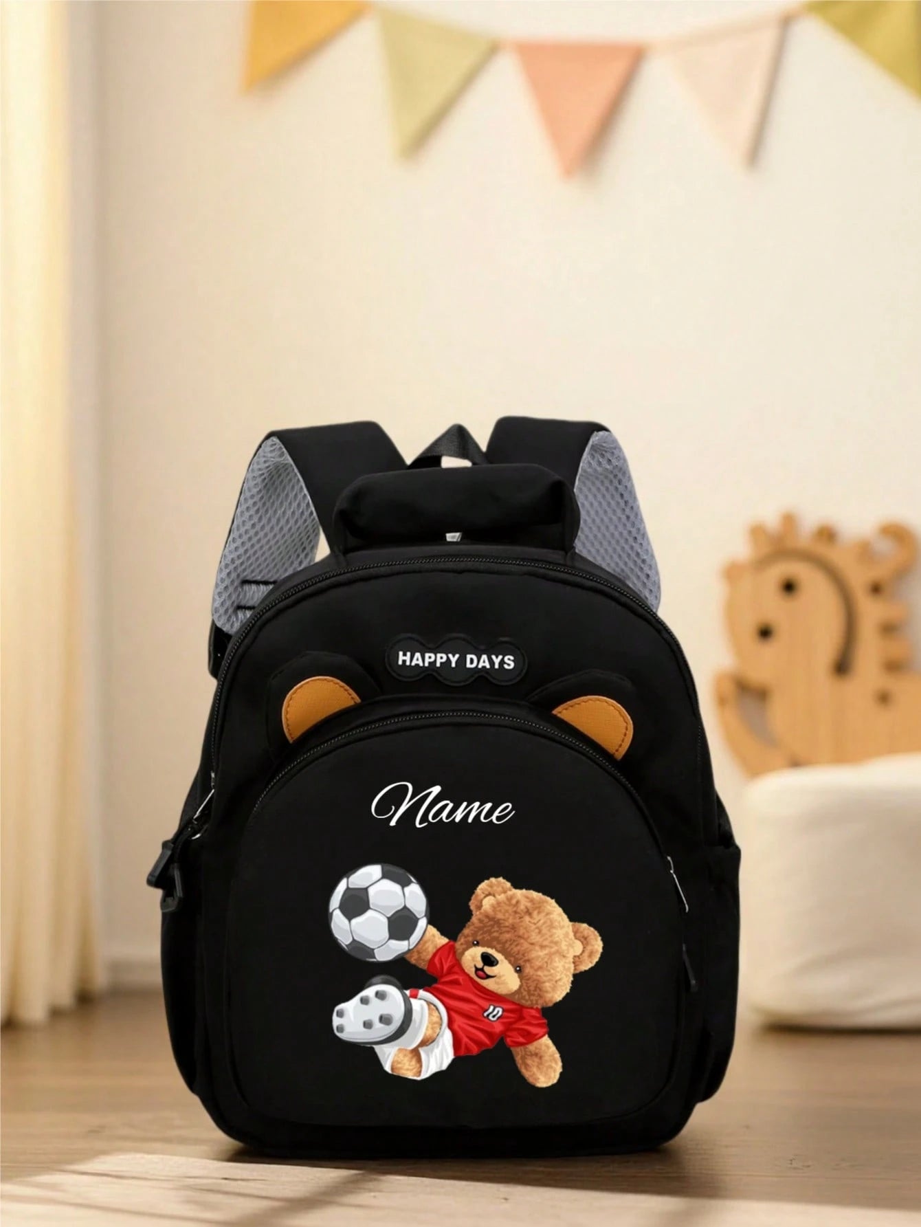 This Cute Cartoon Bear Kicking A Football Mini Customizable Backpack Features A Zipper Design, Can Be Hand-Held Or Adjustable Shoulder Strap Carried, Made Of Nylon Material. Suitable For Daily Use, Ou
